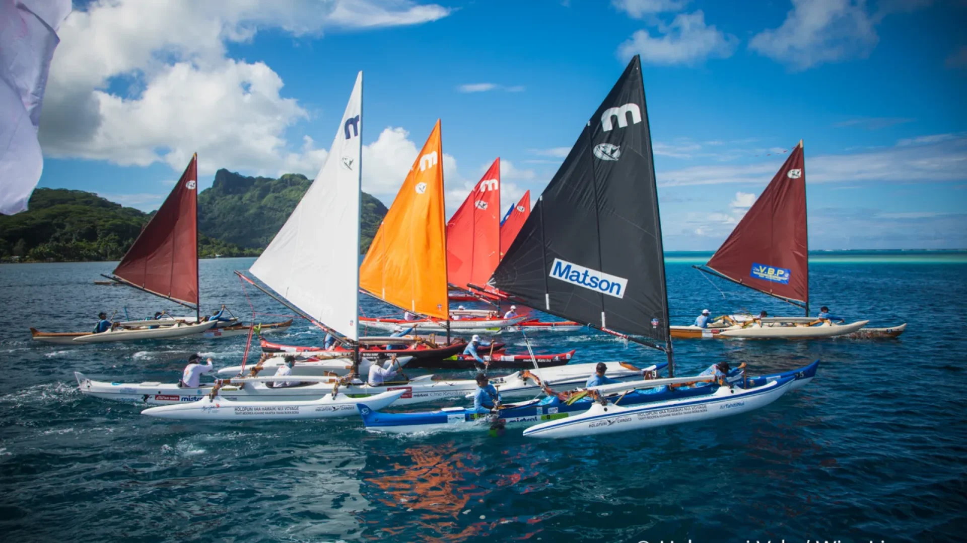 Pahi sailing canoes fushing in the lagoon of Rajatea